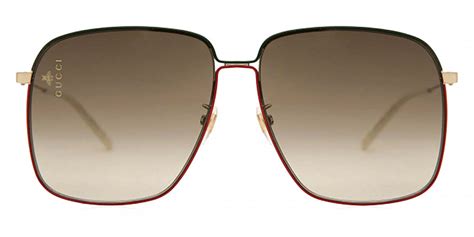 Gucci™ GG0394S 003 61 Gold Sunglasses 